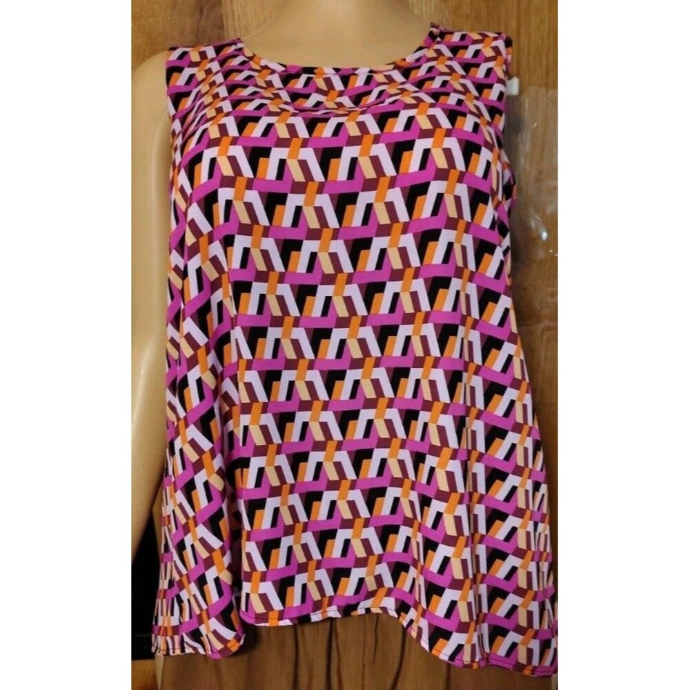 A sleeveless geometric-print top. With A Sloop Neckline, Flowy